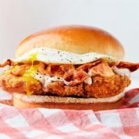 Flyin’ South · Fried chicken, bacon, peppered sausage gravy & over easy egg