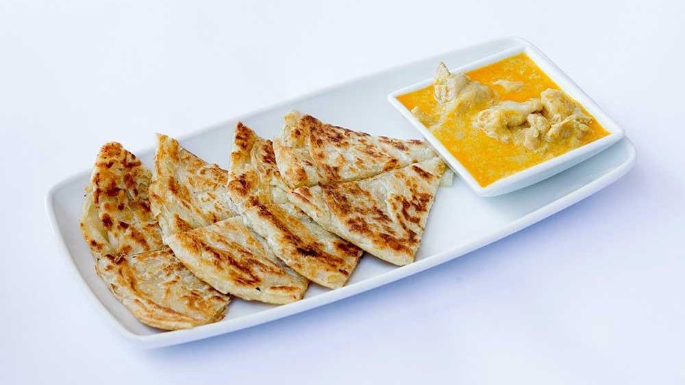 Palata · Spicy Dish. Available with Mild, Medium, Hot or Very Hot. Multi-layer bread served with coconut chicken.