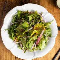 6. Camp Salad · Lettuce, arugula, onions, chili powder tossed with house dressing.