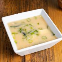 5. Miso Soup · Fermented soybean paste soup with seaweed, tofu and green onion.