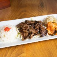 901. Kalbi Chuck Rice · Marinated beef chuck served with mixed veggies.
