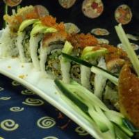 Dragon Roll (8 Pieces) · Shrimp tempura, crab meat, cucumber top with unagi, avocado, and unagi sauce.