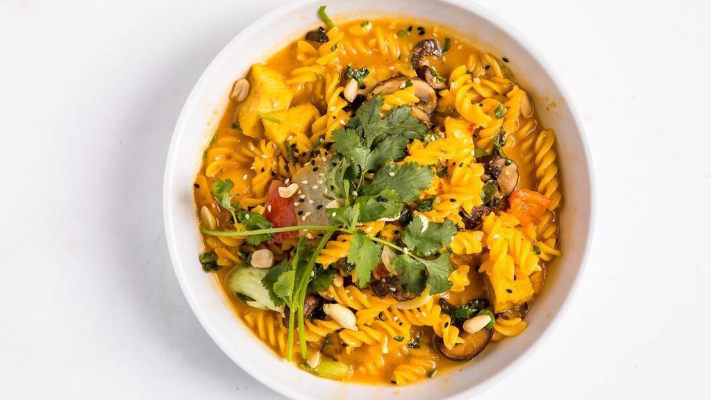 Vegan Noodles · Gluten-free corn fusilli, tofu, mushrooms, bell peppers, bok choy, squash, and peanuts in an orange-sesame-miso broth.