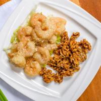 Walnut Shrimp · Lightly breaded fried shrimp topped with glazed walnuts and broccoli
