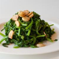Tender Pea Shoots with Garlic · 