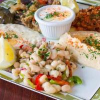 Combo Appetizer Plate · Cakic, eggplant salad, stuffed grape leaves, baba ghanouj, ezme, hummus, and piyaz.