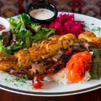 Combo Grill Plate · Lamb shish, chicken shish, beef shish, and meatball. Served with rice and salad.
