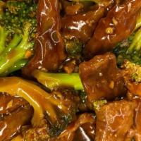 10. Beef with Broccoli · Rice served with fried fish with chili pepper.