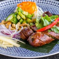 Sai Aou · Lao style aged sausages filled with lean ground pork, pork belly fat, kaffir lime leaf, lemo...
