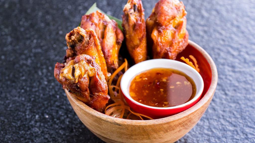 Fried Chicken Wings · Six (6) pieces . Deep fried chicken wings. Served with house-made sweet chili sauce.