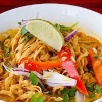 Chiang Mai · Mildly spiced. Crispy egg noodle in yellow curry soup, sliced chicken breast, chicken thighs...