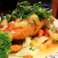 Pla Sam Ross · Mildly spiced. Fried wild-caught Atlantic salmon. Served with pineapple and onions. Topped w...