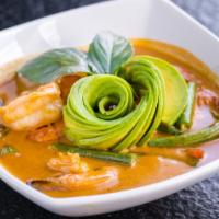 Shrimp Panang Curry  (Gluten-Free) · Mildly spiced. Tiger prawns in coconut red curry with peanut sauce, thai holy basil, red bel...