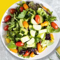 Garden Salad · Cauliflower, cherry tomato, avocado, zucchini, honey mustard dressing.