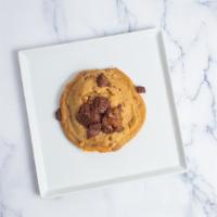 Reese Cookies · Made with pieces of Reese's Peanut Butter Cups. Oversized Cookie.