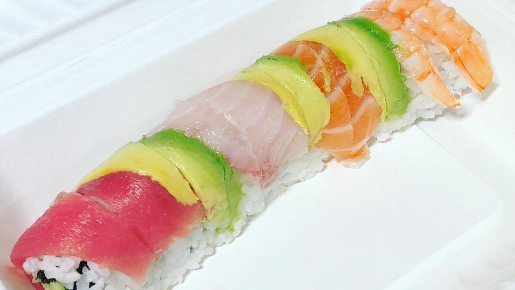 Rainbow Roll · Raw. Crab, avocado, and cucumber with an assortment of fish on top.