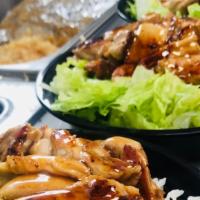 Chicken teriyaki bowl  · Grilled chicken, and salad over rice and special teriyaki sauce.