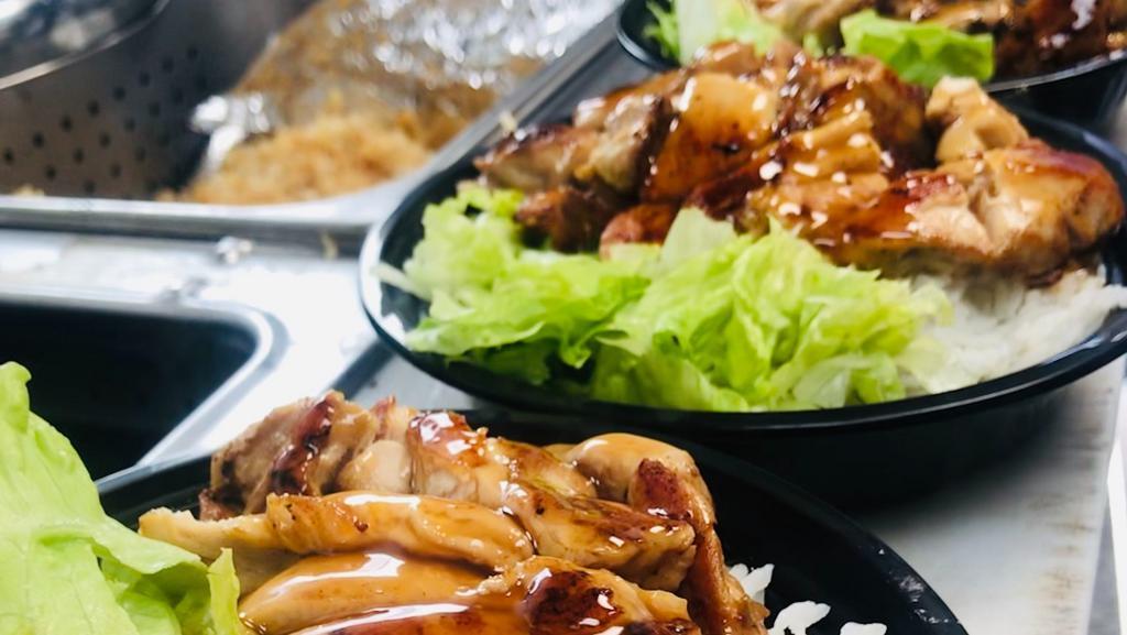 Chicken teriyaki bowl  · Grilled chicken, and salad over rice and special teriyaki sauce.