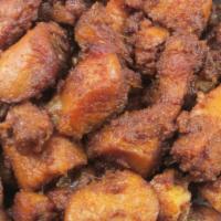 Indian Spicy Popcorn Chicken · Small pieces of spicy chicken  deep fried and served with spicy potatoe fries