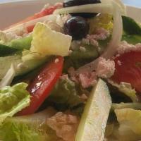 Greek Salad · Romaine lettuce, tomato, cucumber, onion, green peppers, feta cheese and Kalamata olives wit...