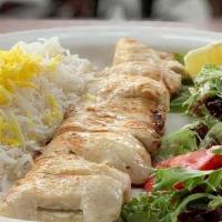 Chicken Barg Kabob · Skewer of thin sliced chicken breast marinated with lime, yogurt, and olive oil.