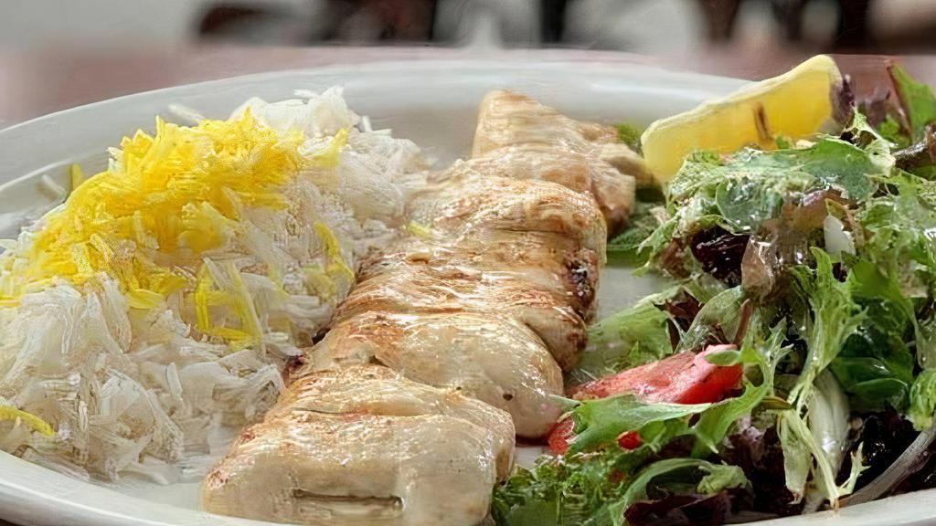 Chicken Barg Kabob · Skewer of thin sliced chicken breast marinated with lime, yogurt, and olive oil.