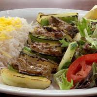 Shish Kabob Special · Filet mignon with onions and green peppers marinated in yogurt, olive oil, and saffron.