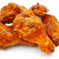 Fried Buffalo Wings · Fresh battered chicken wings fried and smothered in buffalo sauce.