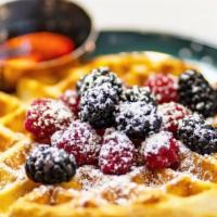 Waffles · Vegetarian. House-made waffle, fresh fruit, real maple syrup.