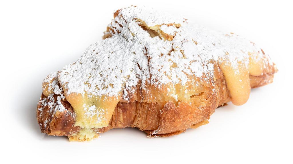Twice Baked Almond Croissant (Veg) · Our sourdough croissant stuffed with house made almond cream, topped with sliced almonds and powdered sugar. Vegetarian, contains nuts