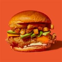 Californian · Our signature fried chicken served on a toasted bun and topped with cheddar cheese, avocado,...