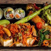 6. Julie's Vegetable Plate · Marinated tofu with avocado, fresh veggie spring roll, grilled veggies, Inari sushi, and jap...