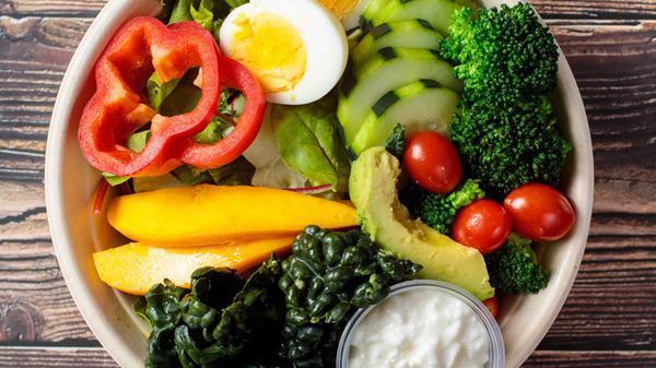 1. Julie's Organic Green Salad · Spring mix, avocado, kale, bell pepper, mango, cherry tomato, broccoli, and egg with balsamic vinaigrette.