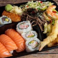 11. Sushi Bento Plate · Nigiri sushi, California rolls, tuna maki, Inari sushi, avocado shrimp, papaya salad, soba n...