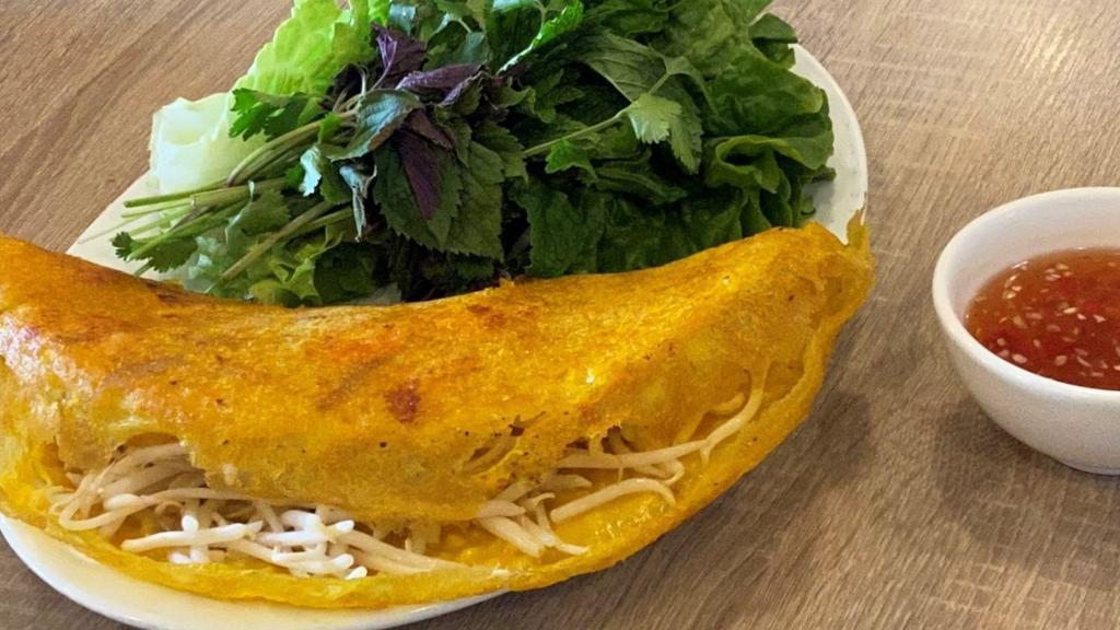 Bánh Xèo · Crispy rice pancake filled with shrimp, pork and bean sprout.