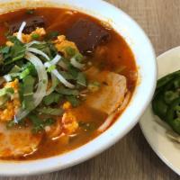 Bún Tôm Cua Huế · Shrimp and crab cake spicy noodle soup with pork & blood cubes.
