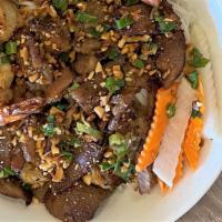 Bún Tôm Thịt Nướng · Grilled shrimp and pork over vermicelli and vegetables.