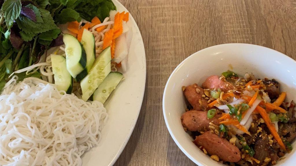 Bún Chả Hà Nội · Hanoi style grilled pork  served with vermicelli and vegetables.