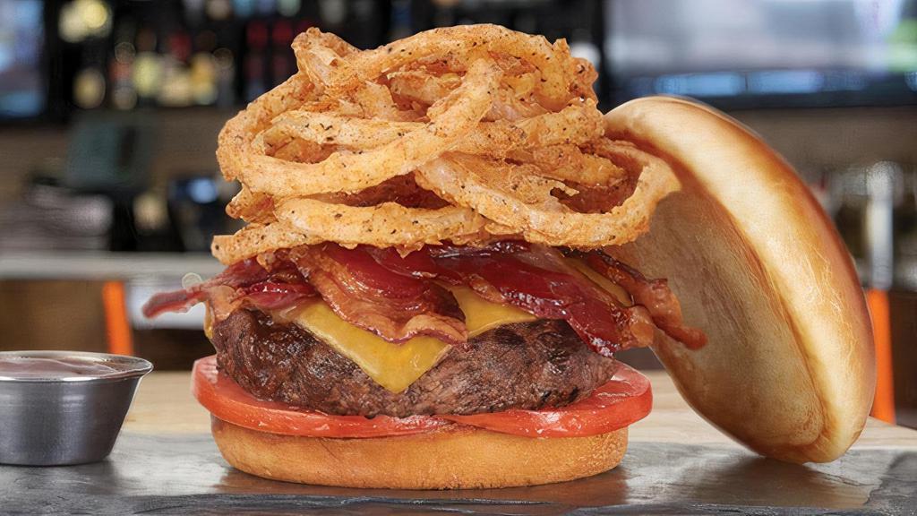 Bacon BBQ · all-natural beef* • tillamook cheddar • applewood smoked bacon • tomatoes • fried onion strings • hickory bbq • brioche bun