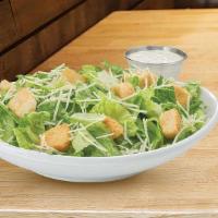 Caesar Salad · lettuce blend • aged parmesan • garlic croutons • tossed with caesar dressing
