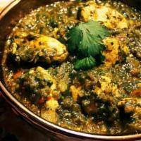 Chicken Saagwala · Chicken cooked with spiced cream spinach.