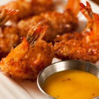 Coconut Fried Shrimp (6) · 6 pieces. Served w/ Guava Dipping Sauce