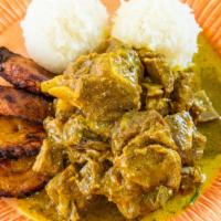 Jamaican Curried Goat · Served w/ Rice and Beans & Fried Plantains