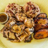 Slow Cooked Jerk Pork · Served w/ Rice and Beans & Fried Plantains