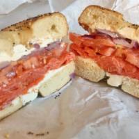 Bagel with Smoked Salmon · Cream cheese, tomato, and red onions.