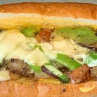 Vegetarian Cheesesteak · Two kinds of cheeses with roasted peppers, onions and roasted portobello mushrooms.
