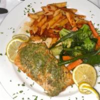 Salmone · Grilled filet of Salmon topped with garlic butter
