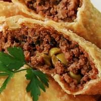 Thin Pastry Deep Fried Envelop with Beef Filling - Pastel de Carne · Thin Pastry Dough - Crispy fried dough stuffed with Ground Beef.