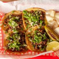 Tacos · Onions, Cilantro, Grilled onions on the side.