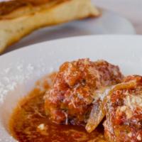 2 Home-Made Sicilian Style Meatballs · Includes 1 order of flatbread.